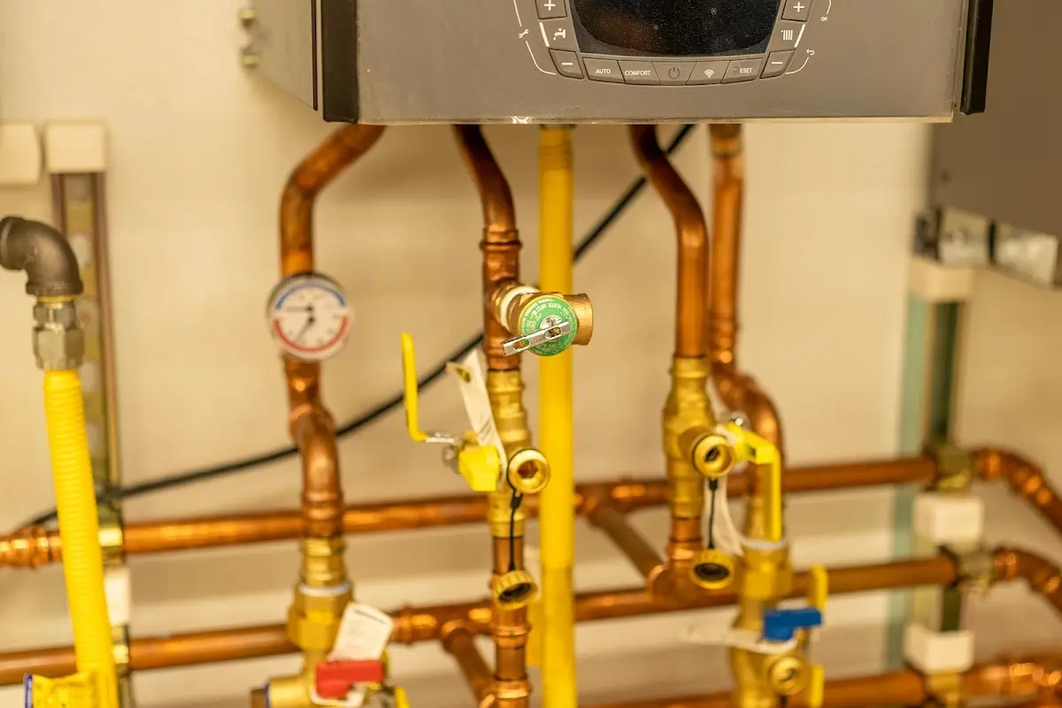 Licensed technician providing Water Heater Installation for a homeowner in Spencer